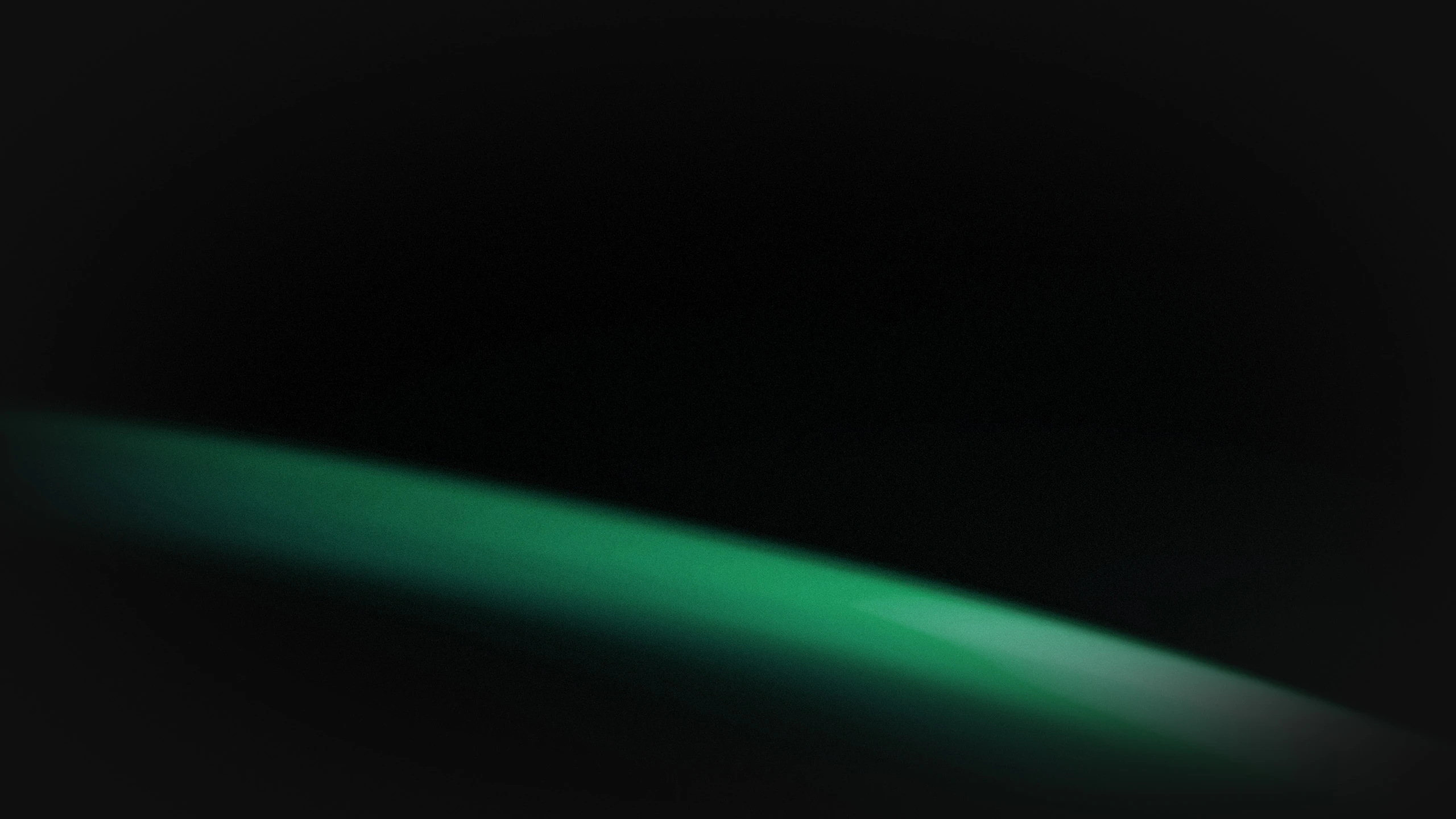 terra artist's depiction. a green arc over a black background.