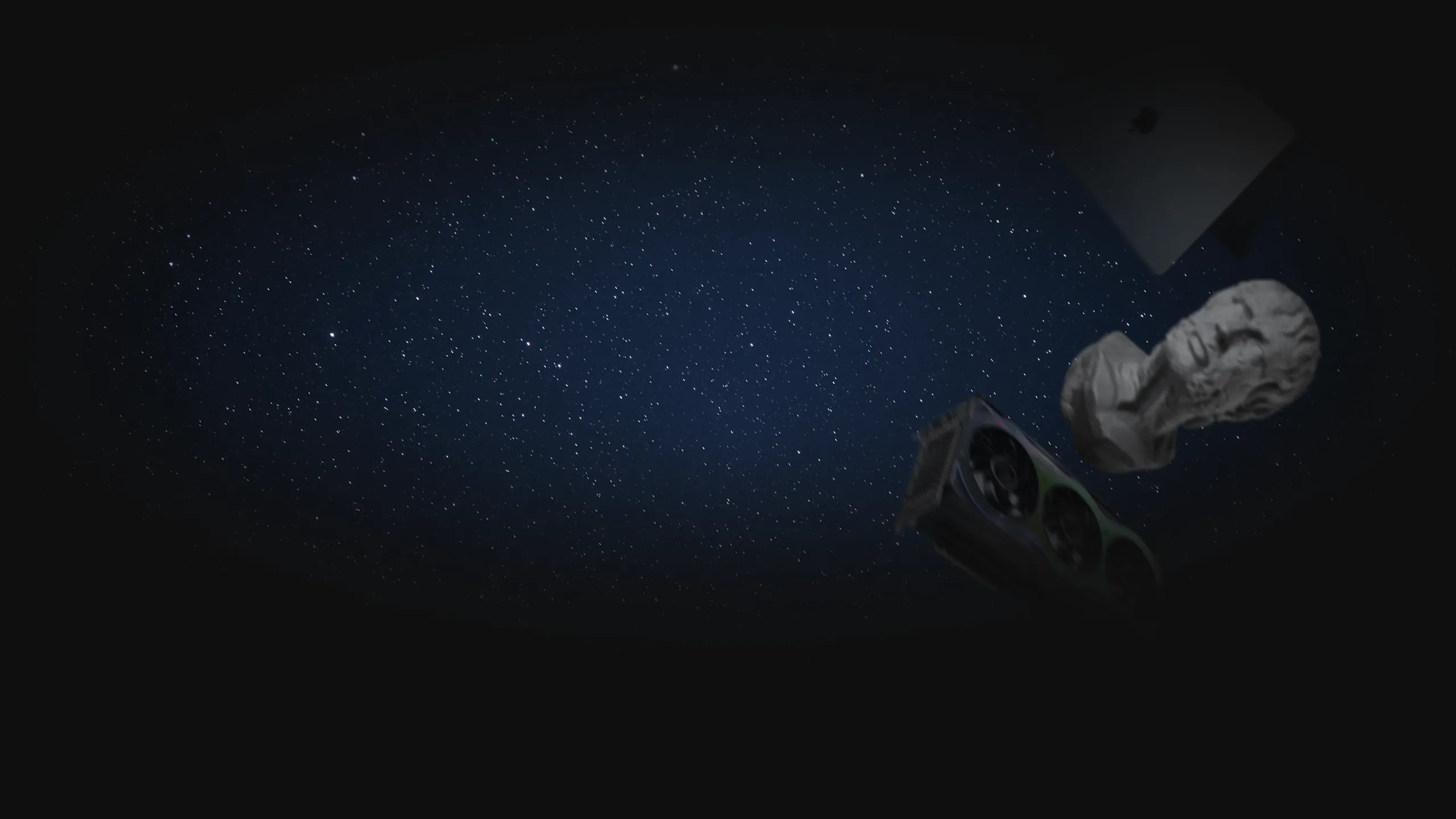 A cosmic-themed hero image showing a GPU, a MacBook Air, and a stone bust of Seneca floating against a starfield background.