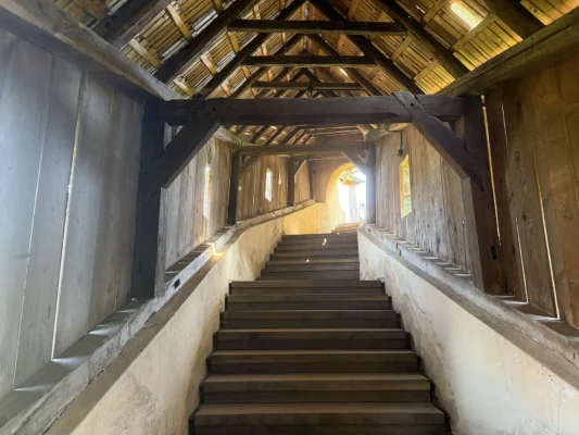 Covered wooden staircase leading up to Biertan fortified church